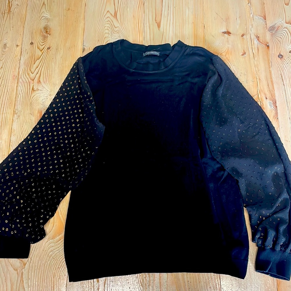 Black sweater with sheer sleeves